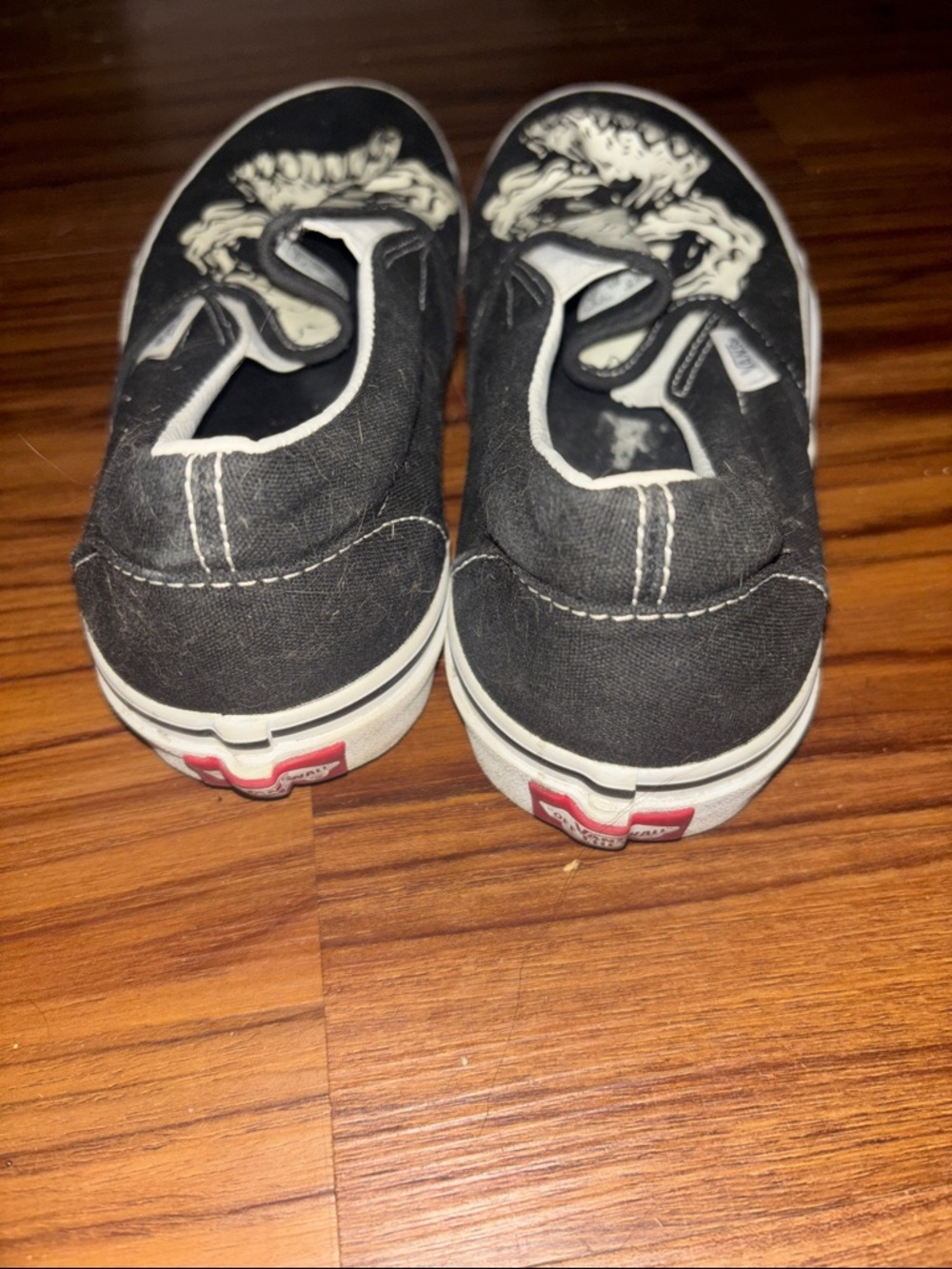Vans Black & White Slip-On Skull Graphic Sneakers - Picture 3 of 3